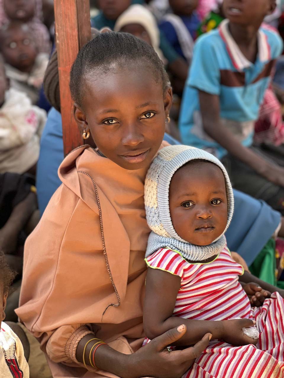woman holding a child